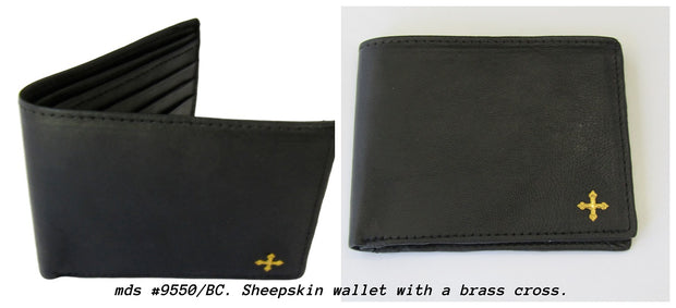 mds#9550/BC. Brass cross on a leather wallet.