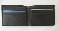 mds#9550/BC. Brass cross on a leather wallet.